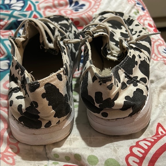 Black and White Cow Print Slip-On Moccasins - Picture 3 of 3